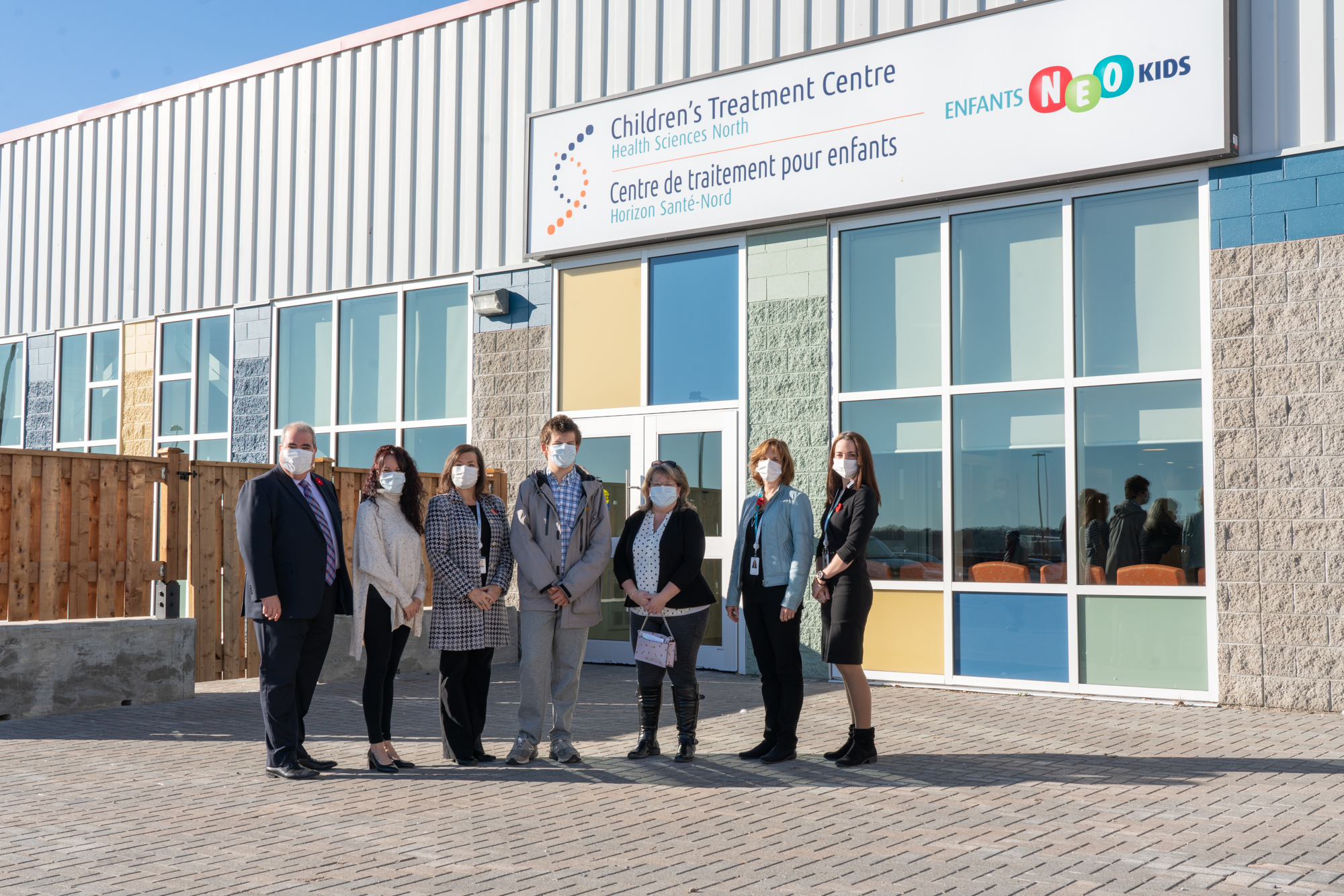 The staff of HSN and CTC standing in front of the new Children's Treatment Centre location.